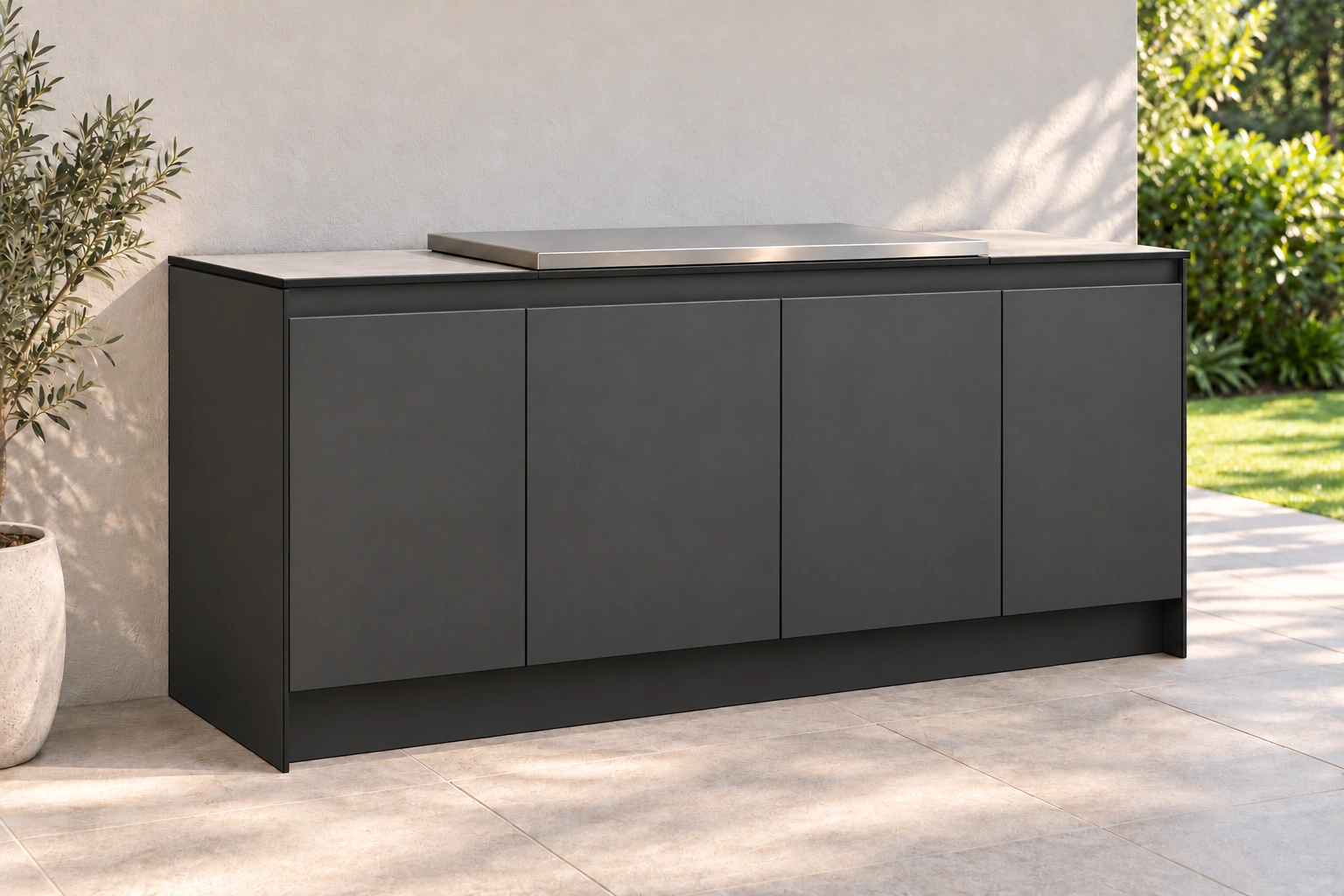 Henley outdoor kitchen in Charcoal Suede with a Light Concrete benchtop, four doors and a flat BBQ cover.
