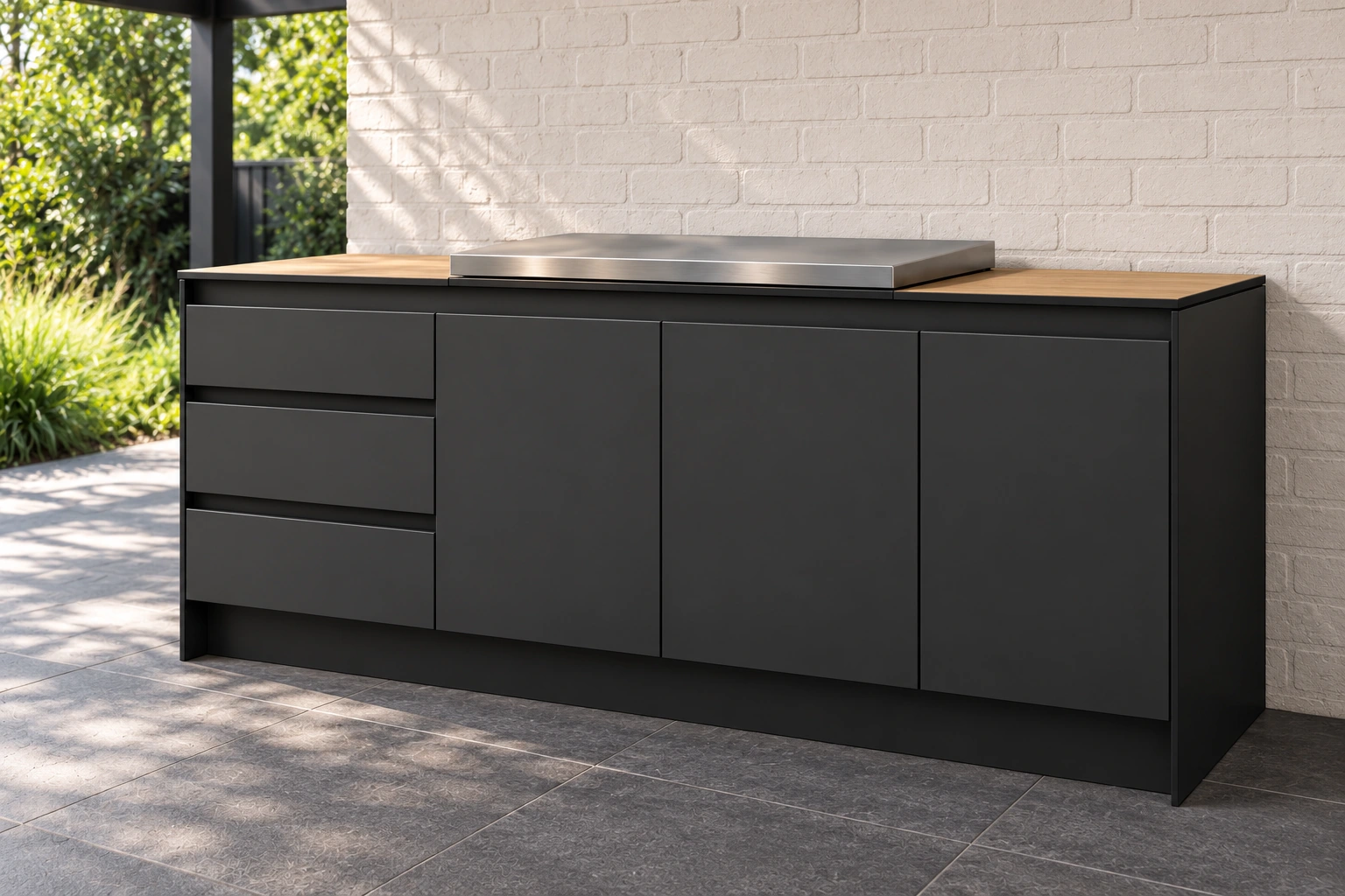 Glenelg outdoor kitchen in Black Suede with a Prime Oak Woodmatt benchtop, left-hand drawers and a flat BBQ cover.
